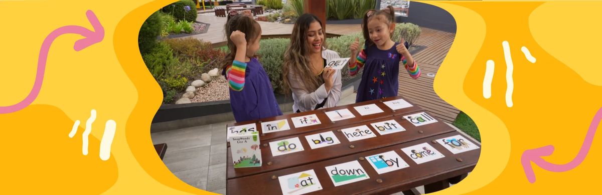 Photo of a mother teaching sight words to her twin daughters.
