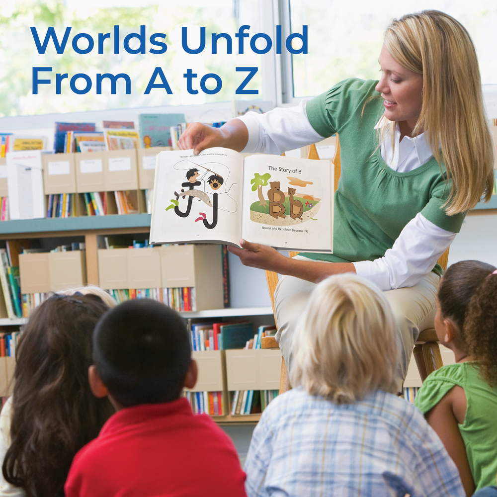 Teacher reading an alphabet book to young students with text 'Worlds Unfold From A to Z' in a classroom setting