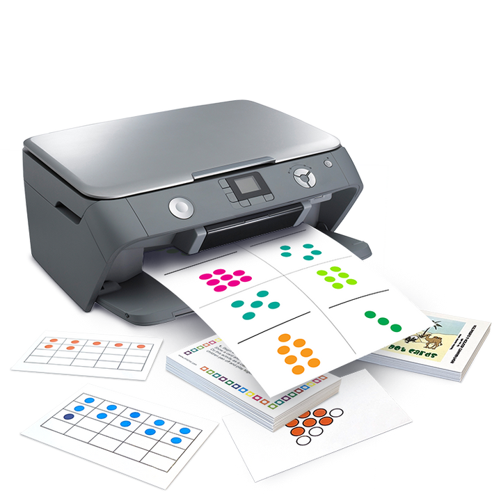 Printer generating colorful dot pattern math worksheets for visual and interactive learning activities