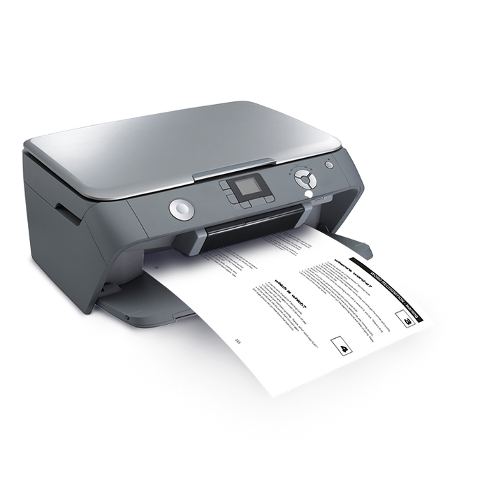 Printer outputting pages from a SnapWords® teaching manual, displaying instructional content for educators on effective literacy teaching strategies.